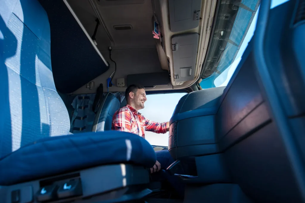 A truck driver driving his rig.