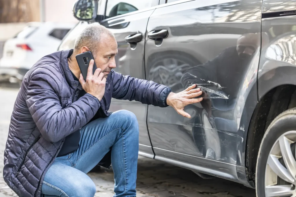 Man calling police after accident.