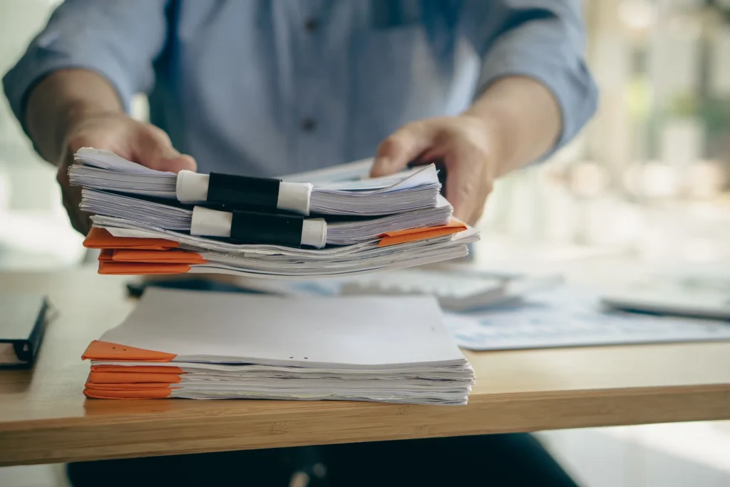 A stack of paperwork for a work injury claim.